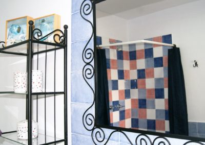 Espejo Artesanal, Baño